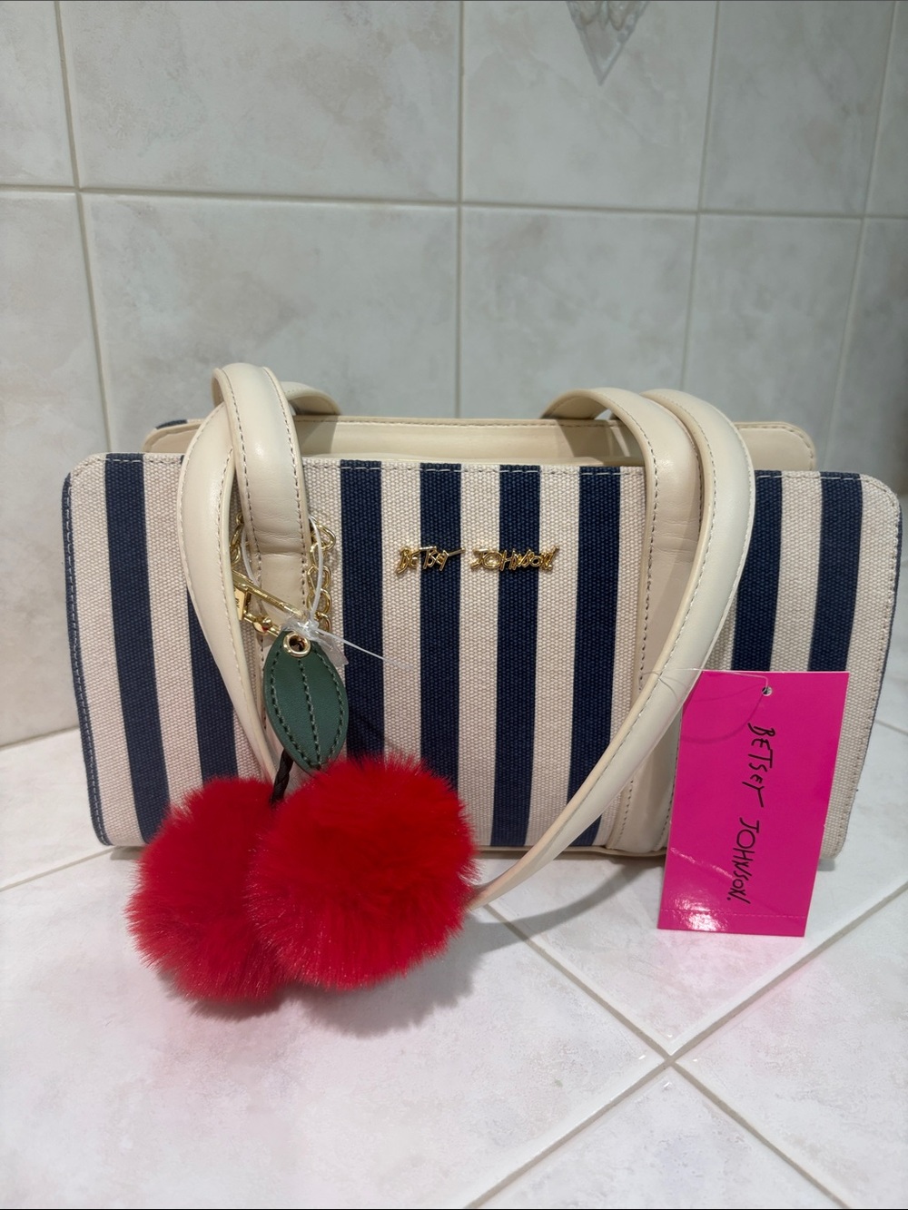 Betsey Johnson Cream & Navy Stripe Top-Handle Bag with Red Cherry Pom Charm